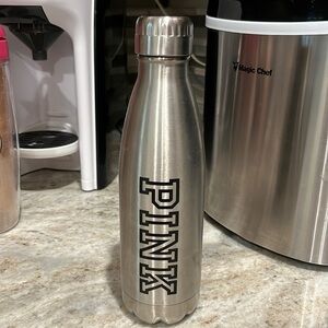 Victoria’s Secret pink - metal water bottle with screw top lid.